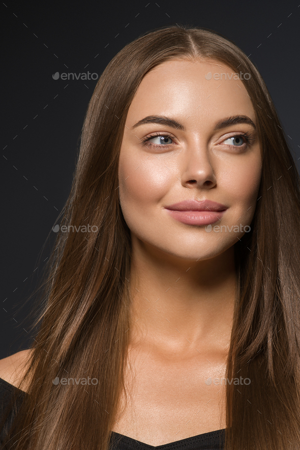 Brunette Woman With Long Hair Natural Tanned Skin Dark Background